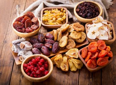 A table of plated various dried fruits