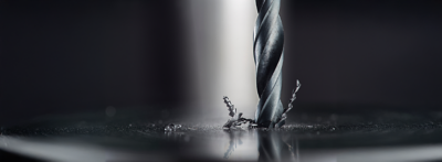 What is the optimal drill speed for different materials?