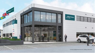 Facility branding showing Atlas Copco Group logotype on the facade.