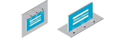 Exterior branding with the Atlas Copco logo lit from above and below.