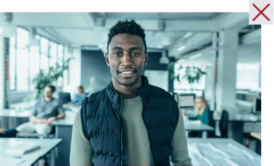 Incorrect image of employee with excessive teal tonality.