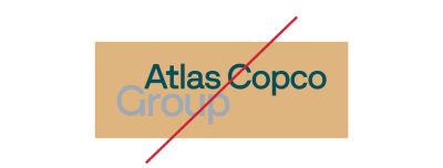 Incorrect Group logotype (on gold background) with a red line across it .