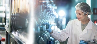 A factory worker in a food and beverage processing industry