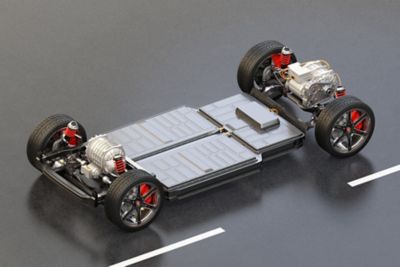 Electric vehicle chassis equipped with battery pack driving on the road. 3D rendering image.