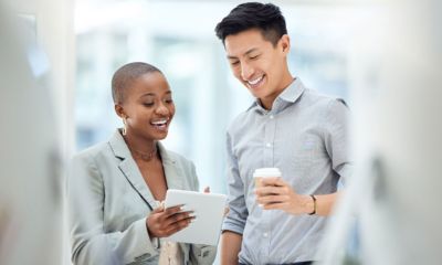 Two colleagues having coffee.