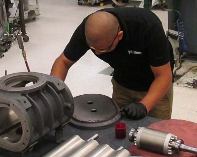 man servicing pump trillium