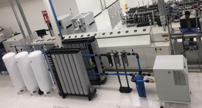 Clean, modern industrial facility featuring advanced nano compressed air treatment systems, nitrogen generators, and oil water separators designed for high‑precision electronics and semiconductor production.”