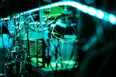 A large component of a Quantum computer surrounded by wires 