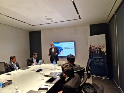 Photo of participants of the Sales Summit 2025 in conference room.