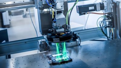 Sealing application for power electronics electronics with dispensing technology from the Atlas Copco product line Scheugenpflug combined with a RTVision inspection system