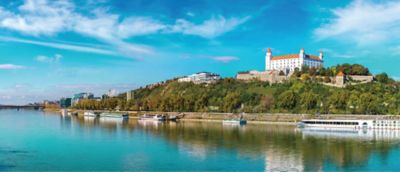 The castle, perched high above the city on a hill., is the dominant landmark of Bratislava.