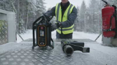 pfxc and revo on the back of a truck with worker