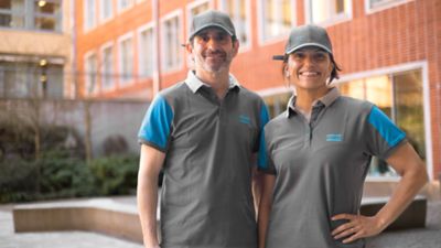 Landscape shot of two Atlas Copco service technicians